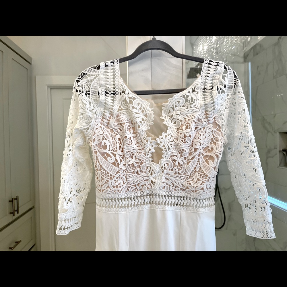 Ivory crochet top maxi dress with 3/4 sleeves and side slit. Size medium